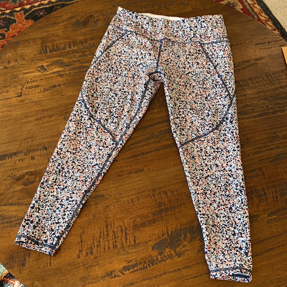 Sweaty Betty Bum Sculpting leggings size M.  Navy Periwinkle and Melon